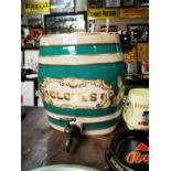 19th. C. green ceramic Cloves Spirit dispenser.