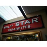 Will's Star Cigarettes advertising sign.