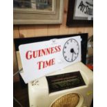 Guinness Time advertising clock.