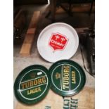 Collection of three advertising drinks trays.