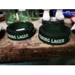 Two Tuborg green glass ashtrays