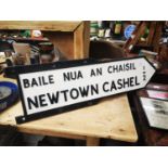 Newtown Cashel 1/2 Mile as Gaegile finger cast iron post sign.