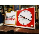 Draught Guinness electric Perspex advertising clock.
