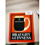Draught Guinness Counter advertising sign.