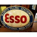 Esso McGintys Filling Station advertising sign.