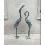 Pair of bronze models of storks .