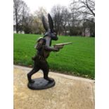 Bronze figure of a rabbit modelled as a hunter W 70cms H 90cms D 35cms