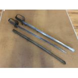 Pair of steel swords by Wilkinson London L 107