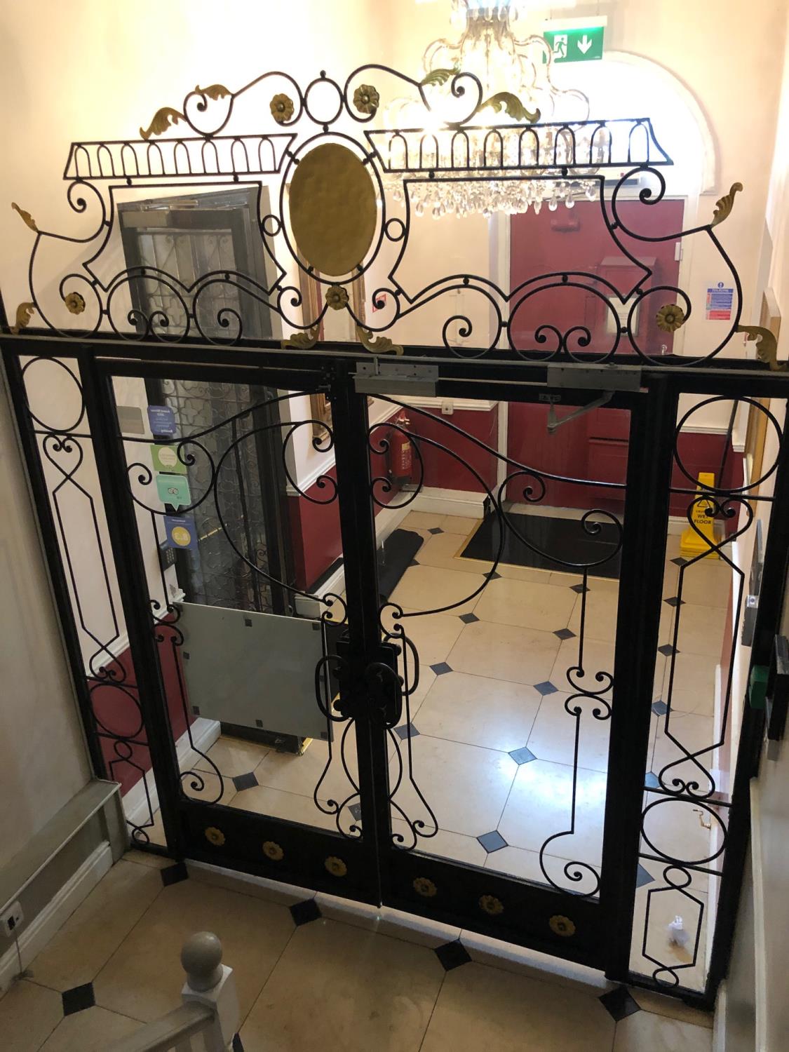 Spectacular wrought iron doorway embellished with gold throughout W 250cm H 300cm