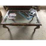 Silvered and gilt coffee table with glass inset top