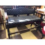 Large bench covered in patterned fabric W 152cm H 115cm D 53cm
