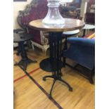 Tall hardwood circular topped table on wrought iron base W 60cm H 110cm