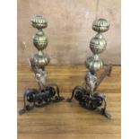 Superb pair of Regency fire dogs, brass & wrought iron embellished with robed gentlemen W 40cms H73