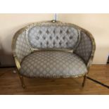 French style 2 seater gilt settee, with deep buttoned upholstery W 122cm
