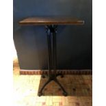 Tall bar table with rectangular top above wrought iron base W 60cm H 110cm D 50cm