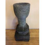 18th century limestone font, with organic decoration W 25cm H 57cm