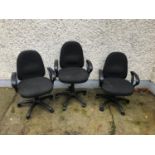 Set of three swivel office chairs