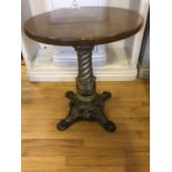 Circular hardwood restaurant table with decorative gold cast iron base W 60cm H 71cm