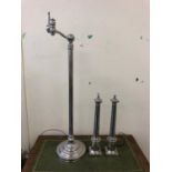 Pair of chrome lamps, and an adjustable chrome reading lamp, tallest 120cm high