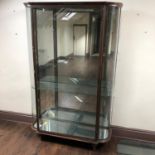Rare antique steel display cabinet with curved glass sides & large central door