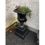 Pair of Victorian style cast iron garden urns on bases 46 W 94 H