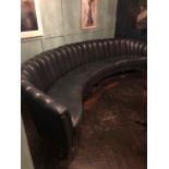 Large curved leather upholstered couch with ribbed back W 380cm H 90cm D 145cm