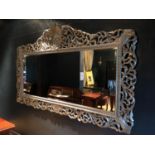 Spectacular and monumental carved wood silvered mirror with bevelled glass W 280cm H 170cm