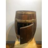 Antique oak bronze bound barrel, converted into a drinks cabinet W 50cm H 30cm D 35cm