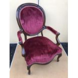 Victorian mahogany armchair upholstered in velvet fabric