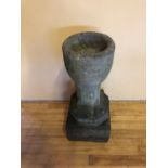 18th century limestone font, with organic decoration W 26cm H 67cm