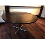 Walnut circular restaurant table on chrome base W 143cms H 72cms