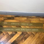 Two bronze library signs in Gaelic W 95cm
