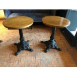 Fine pair of restaurant tables above decorative cast iron bases W 60cm H 75cm