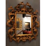 Rococo style carved wood and gilt mirror W 90cm H 105cm