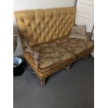 Baroque style 2 seater settee, the carved wood arms and base with painted and gilt finish
