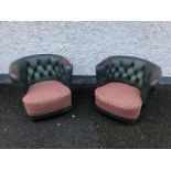 Pair of vintage leather tub chairs