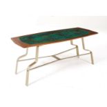 Wooden coffee table with brass legs and glass top