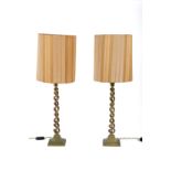 Pair of torchon brass lamps. '50s