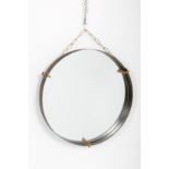 Round iron mirror with brass chain. '50s