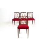 Four wooden chairs with red fabric seat. '50s