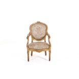 Finely carved and gilded wood armchair.