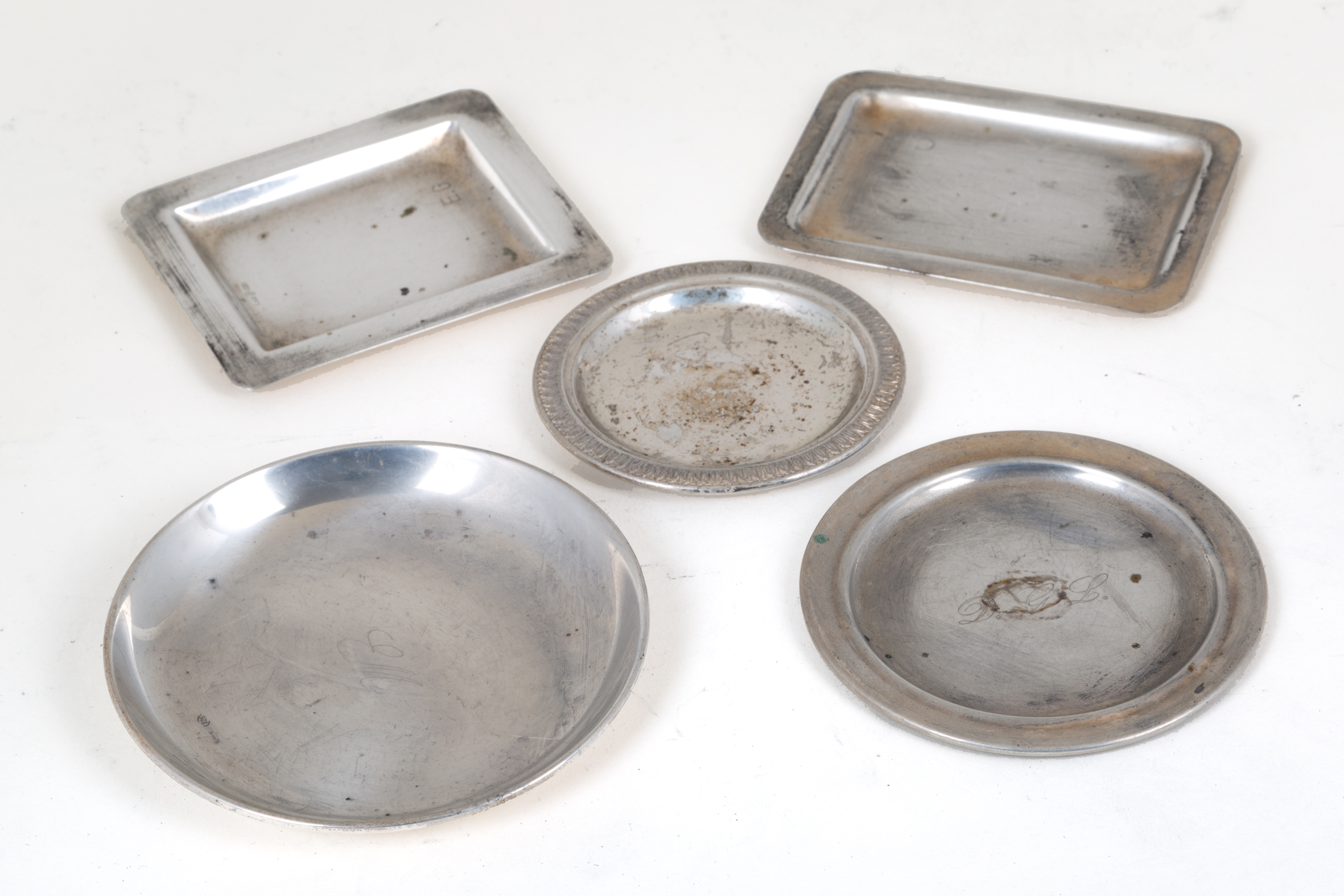 Five small silver trays, gr. 170 ca. 20th century