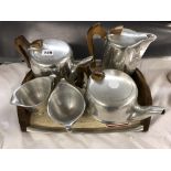 MID 20TH CENTURY PICQUOT WARE AND A SIX PIECE TEA/COFFEE SERVICE