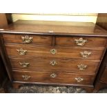 GEORGE III MAHOGANY SMALL CHEST OF TWO SMALL DRAWERS OVER THREE LONGER DRAWERS ON BRACKET FEET 73CM