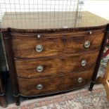 REGENCY MAHOGANY BOW FRONTED CHEST FITTED WITH A BRUSHING SLIDE ABOVE THREE DRAWERS,