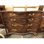 GEORGE III MAHOGANY CROSS BANDED SERPENTINE CHEST MOULDED TOP OVER FOUR GRADUATED DRAWERS ON CANTED