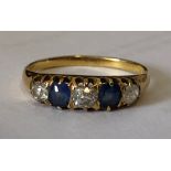 LADIES YELLOW METAL THREE DIAMOND AND TWO SAPPHIRE RING SIZE T 3.
