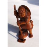 JAPANESE NETSUKE OF A FARMER