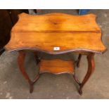 EDWARDIAN SERPENTINE SHAPED TABLE AND A MAHOGANY NEO CLASSICAL STYLE PLANTER TABLE