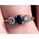 18CT GOLD SAPPHIRE AND TWO DIAMOND RING 3G APPROX SIZE N/O